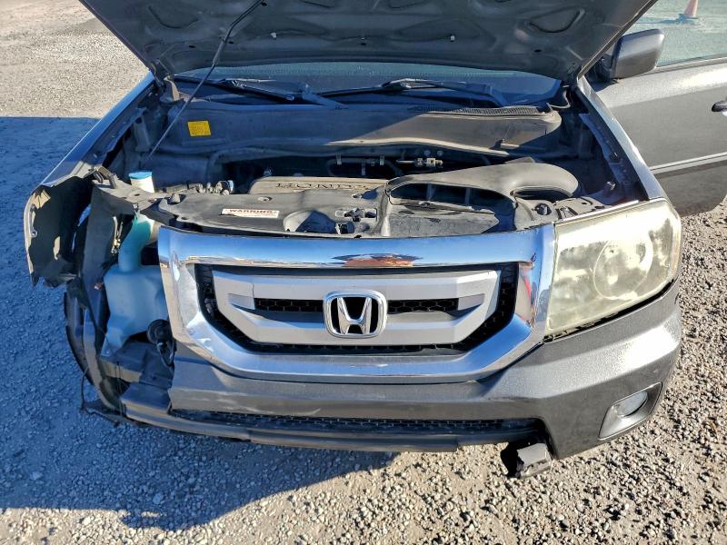 Photo 12 from auction – 2010 HONDA PILOT EXL with VIN 5FNYF3H58AB008045