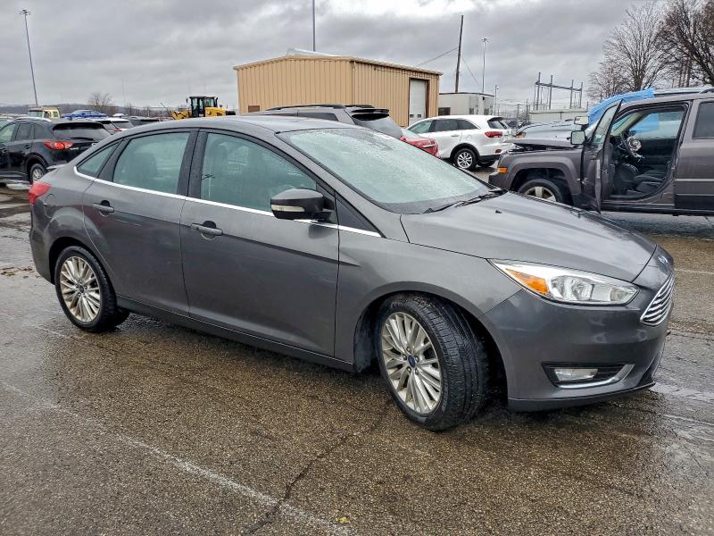 Photo 4 from auction – 2016 FORD FOCUS TITA with VIN 1FADP3J27GL230051