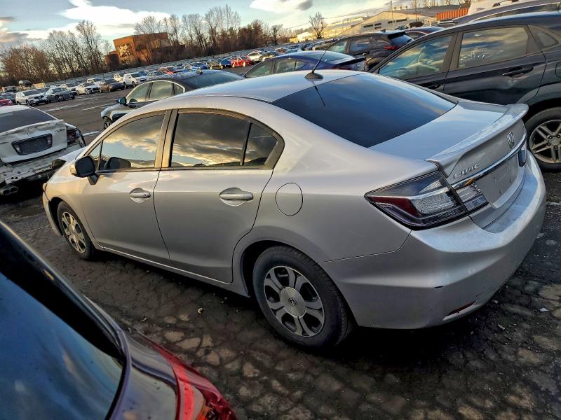 Photo 2 from auction – 2013 HONDA CIVIC HYBR with VIN 19XFB4F31DE000812