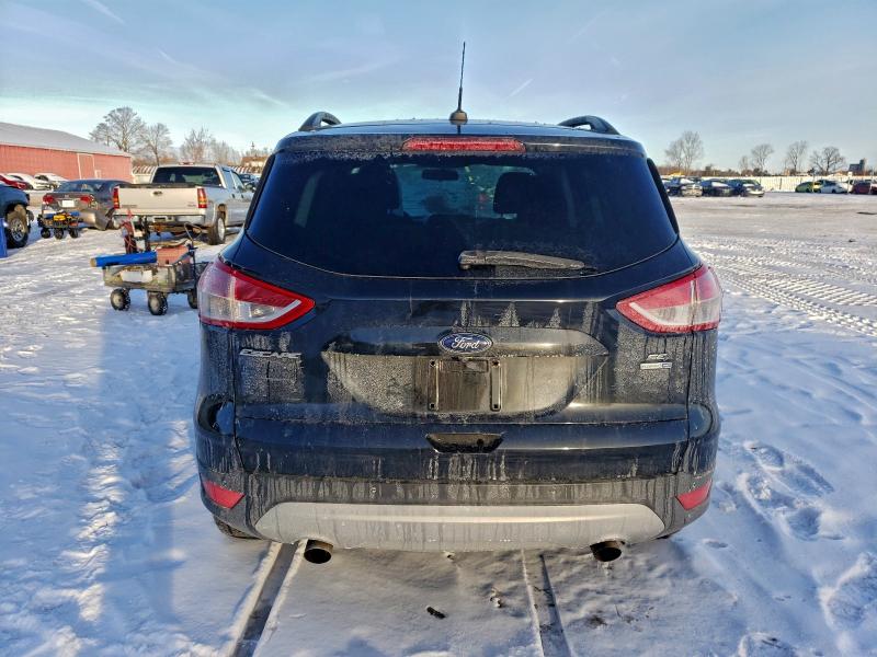 Photo 6 from auction – 2014 FORD ESCAPE SE with VIN 1FMCU9G90EUE30309