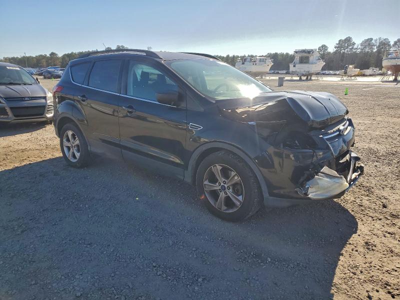 Photo 4 from auction – 2015 FORD ESCAPE SE with VIN 1FMCU9GX4FUA97273