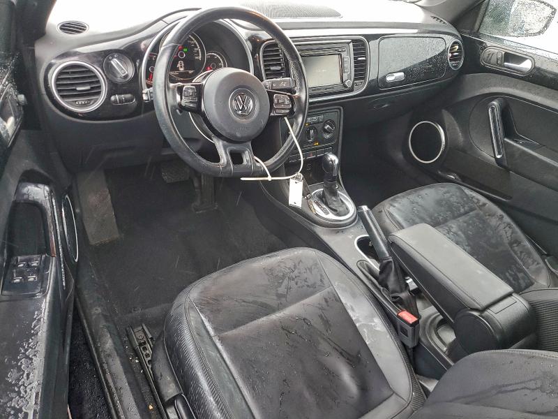 Photo 8 from auction – 2013 VOLKSWAGEN BEETLE with VIN 3VW5P7AT9DM830141