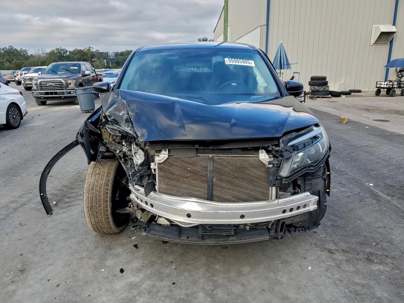 Photo 5 from auction – 2019 HONDA RIDGELINE with VIN 5FPYK3F14KB023288