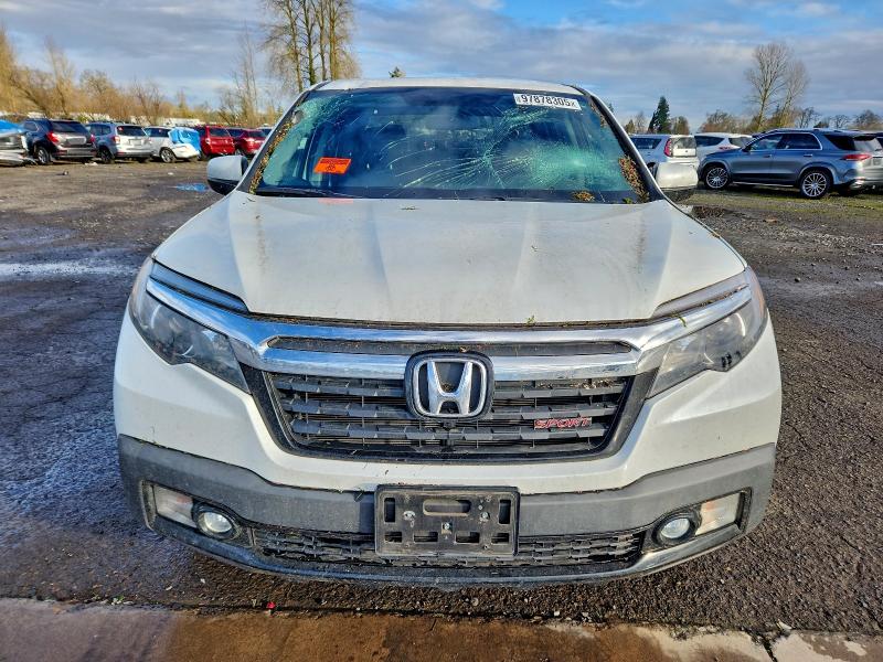 Photo 5 from auction – 2019 HONDA RIDGELINE with VIN 5FPYK3F13KB049509