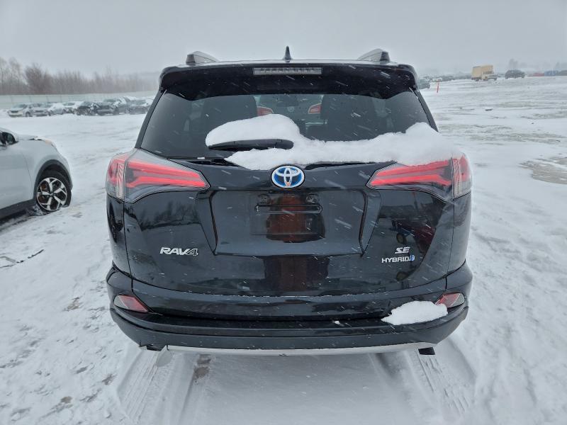 Photo 6 from auction – 2017 TOYOTA RAV4 HV SE with VIN JTMJJREV5HD110444