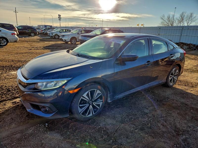 HONDA CIVIC EX 2016 with VIN 19XFC1F42GE024058 - Photo from auction
