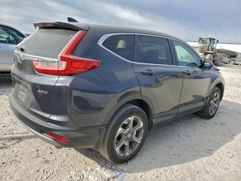 Photo 3 from auction – 2018 HONDA CR-V EXL with VIN 7FARW2H86JE090774