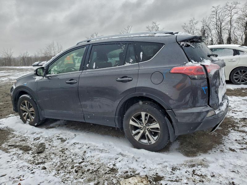 Photo 2 from auction – 2017 TOYOTA RAV4 XLE with VIN JTMRFREV1HJ153278