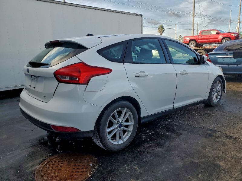 Photo 3 from auction – 2018 FORD FOCUS SE with VIN 1FADP3K22JL213101
