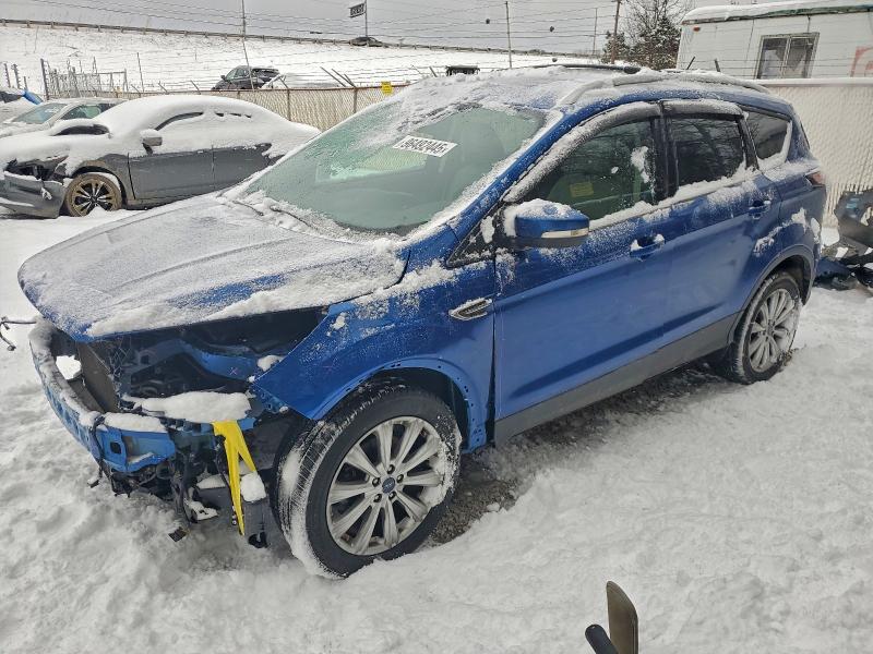 FORD ESCAPE TIT 2017 with VIN 1FMCU0JD9HUA36076 - Photo from auction