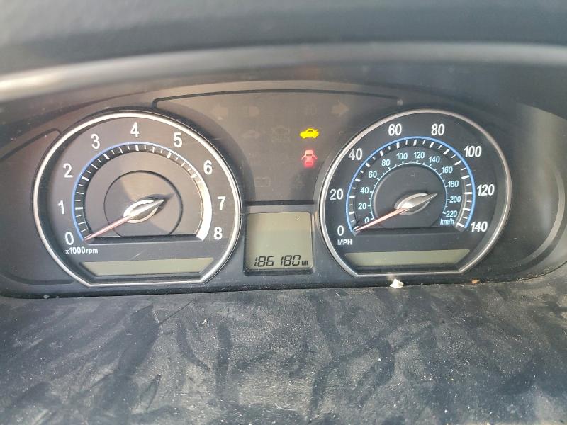 Photo 9 from auction – 2006 KIA OPTIMA LX with VIN KNAGE123865057908