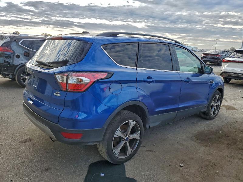Photo 3 from auction – 2017 FORD ESCAPE SE with VIN 1FMCU0G99HUE86393