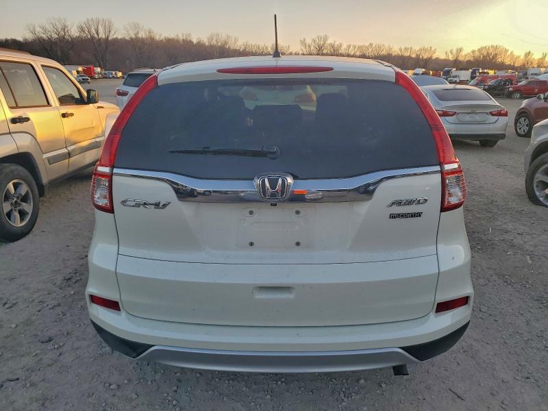 Photo 6 from auction – 2015 HONDA CR-V EX with VIN 5J6RM4H51FL131393