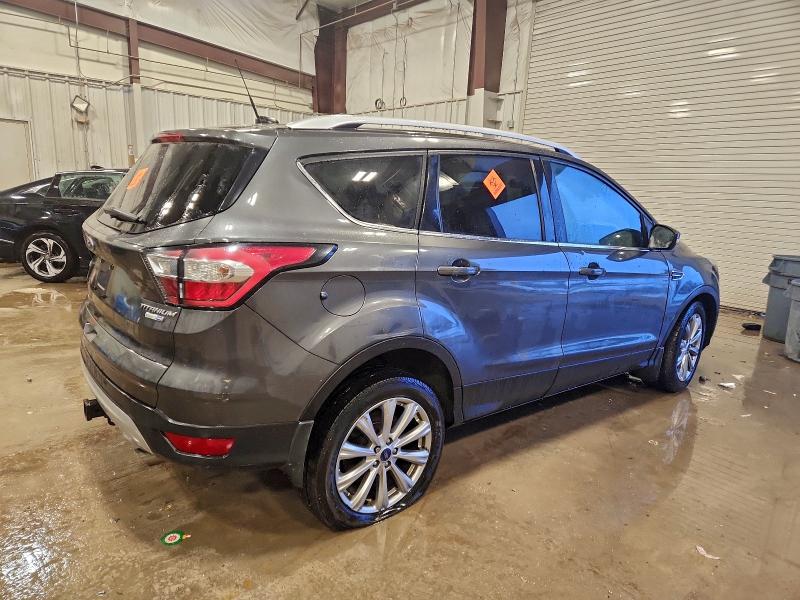 Photo 3 from auction – 2017 FORD ESCAPE TIT with VIN 1FMCU9J90HUD69301