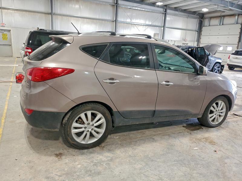 Photo 3 from auction – 2012 HYUNDAI TUCSON LIM with VIN KM8JUCAC0CU404542