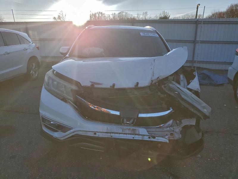 Photo 5 from auction – 2015 HONDA CR-V EXL with VIN 5J6RM4H72FL021146
