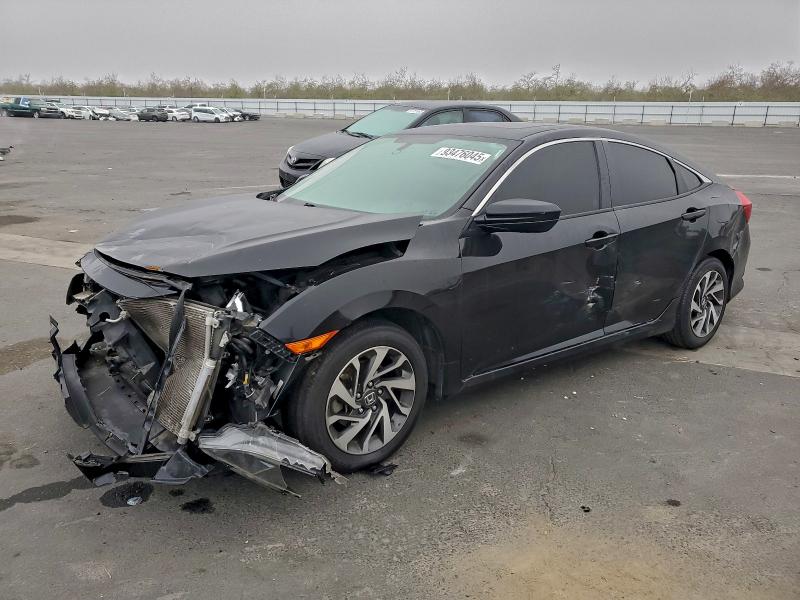 HONDA CIVIC EX 2018 with VIN 2HGFC2F72JH530437 - Photo from auction