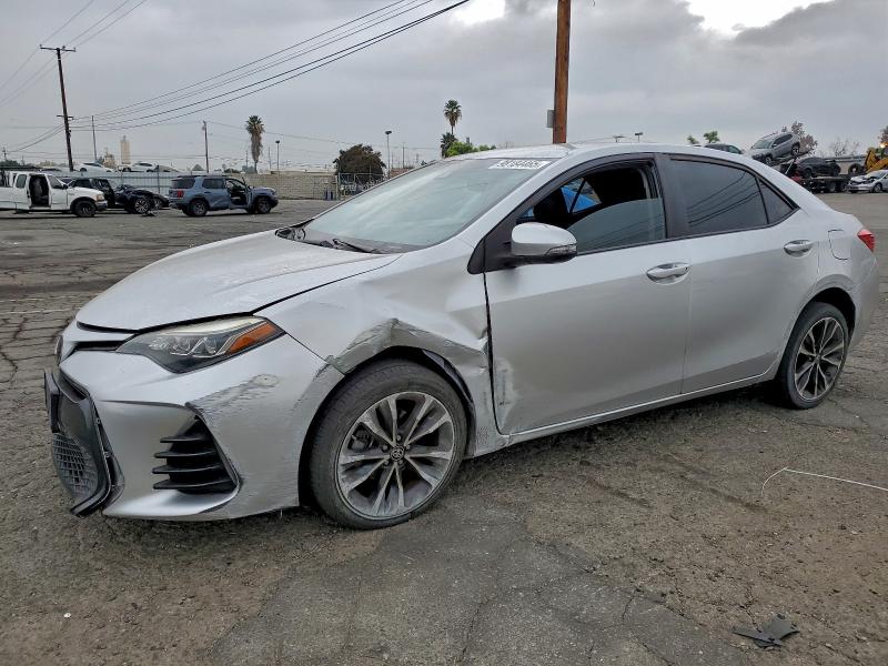TOYOTA COROLLA L 2018 with VIN 5YFBURHEXJP765824 - Photo from auction