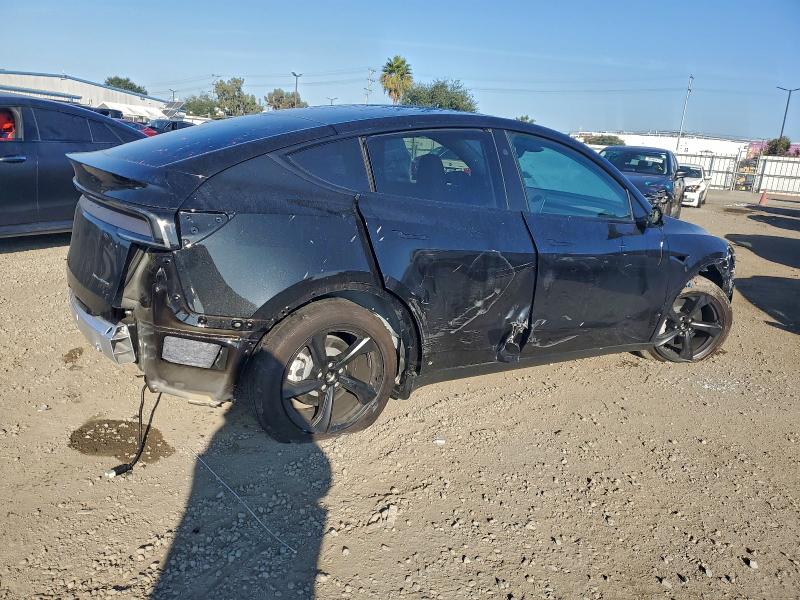 Photo 3 from auction – 2026 TESLA MODEL Y with VIN 7SAYGDEE8TF392602