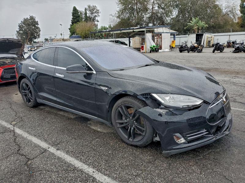 Photo 4 from auction – 2014 TESLA MODEL S with VIN 5YJSA1H13EFP36142