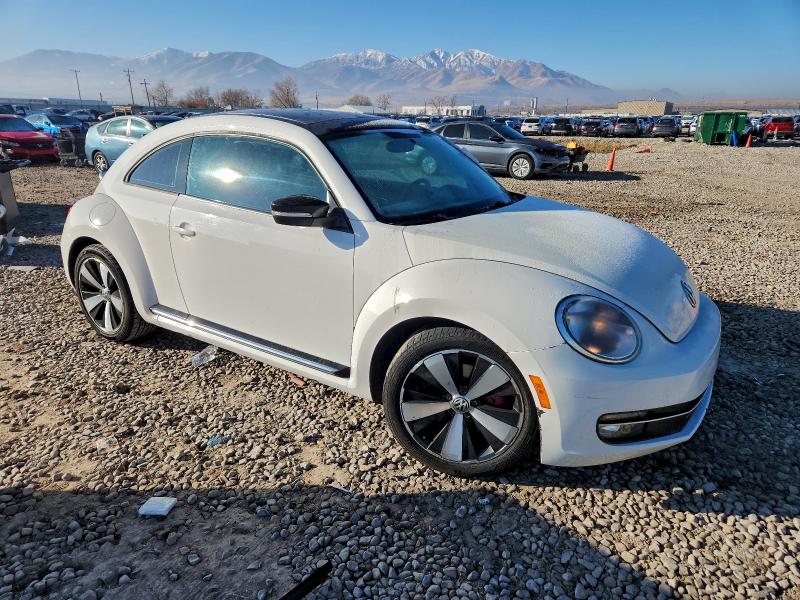 Photo 4 from auction – 2012 VOLKSWAGEN BEETLE TUR with VIN 3VWVA7AT3CM610235