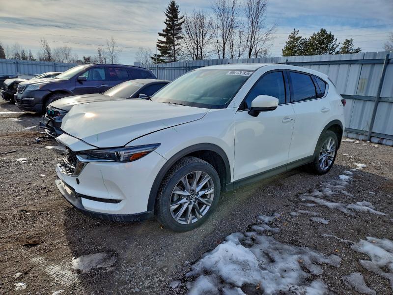 MAZDA CX-5 GT 2021 with VIN JM3KFBDY7M0128123 - Photo from auction