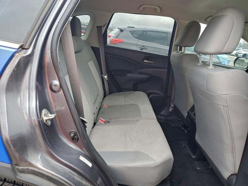Photo 11 from auction – 2015 HONDA CR-V LX with VIN 3CZRM3H35FG706925