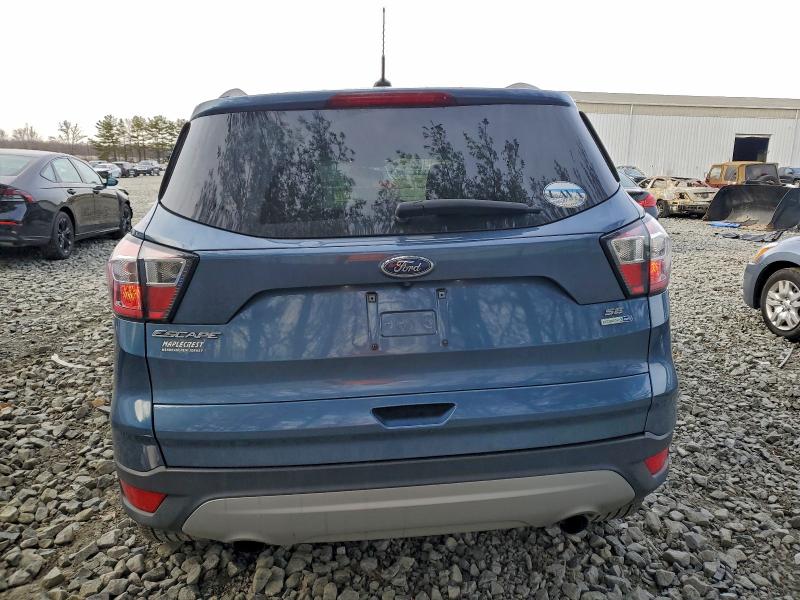 Photo 6 from auction – 2018 FORD ESCAPE SE with VIN 1FMCU9GD7JUB79089
