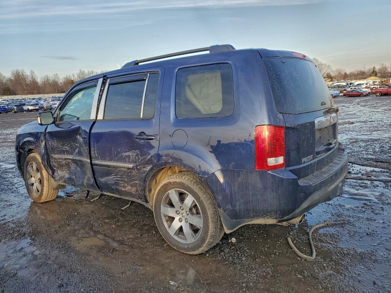 Photo 2 from auction – 2015 HONDA PILOT TOUR with VIN 5FNYF4H92FB041056