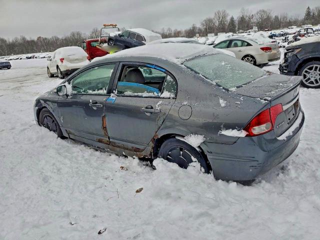 Photo 2 from auction – 2009 HONDA CIVIC HYBR with VIN JHMFA36239S007834