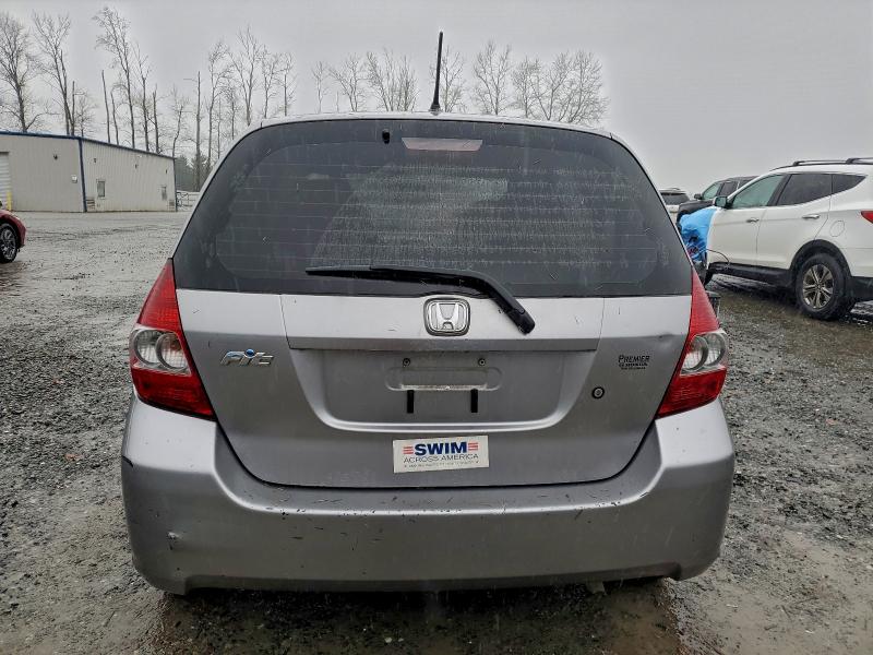 Photo 6 from auction – 2007 HONDA FIT with VIN JHMGD37467S031506