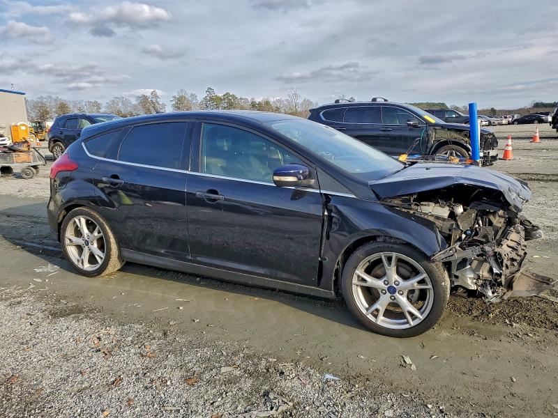 Photo 4 from auction – 2015 FORD FOCUS with VIN 1FADP3N23FL328454