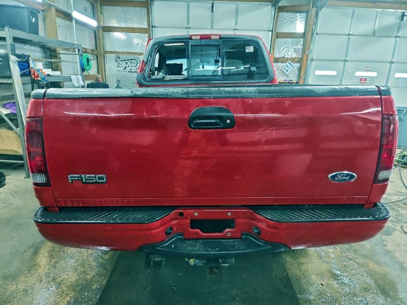 Photo 6 from auction – 2002 FORD F150 with VIN 1FTRX18L32NA53787