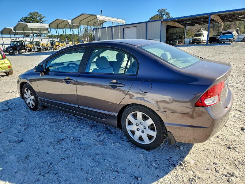 Photo 2 from auction – 2011 HONDA CIVIC LX with VIN 19XFA1F54BE048529