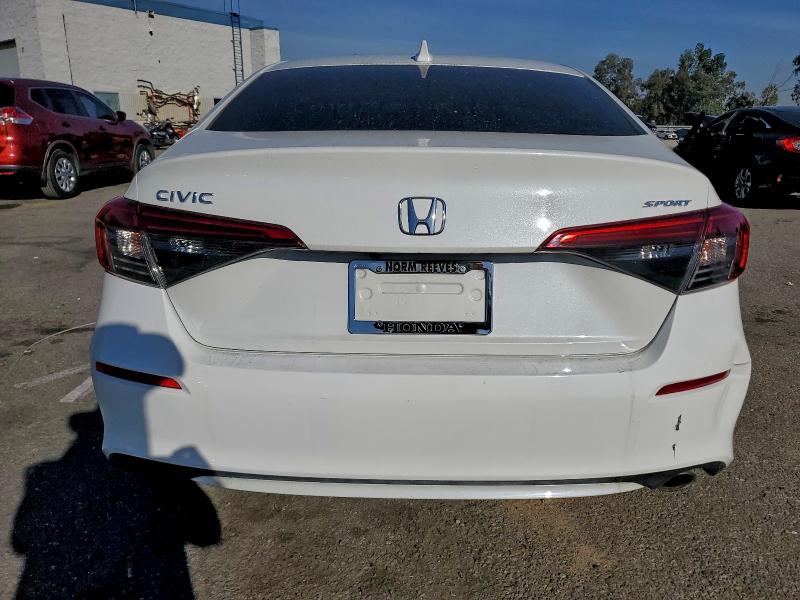 Photo 6 from auction – 2022 HONDA CIVIC SPOR with VIN 2HGFE2F50NH561216