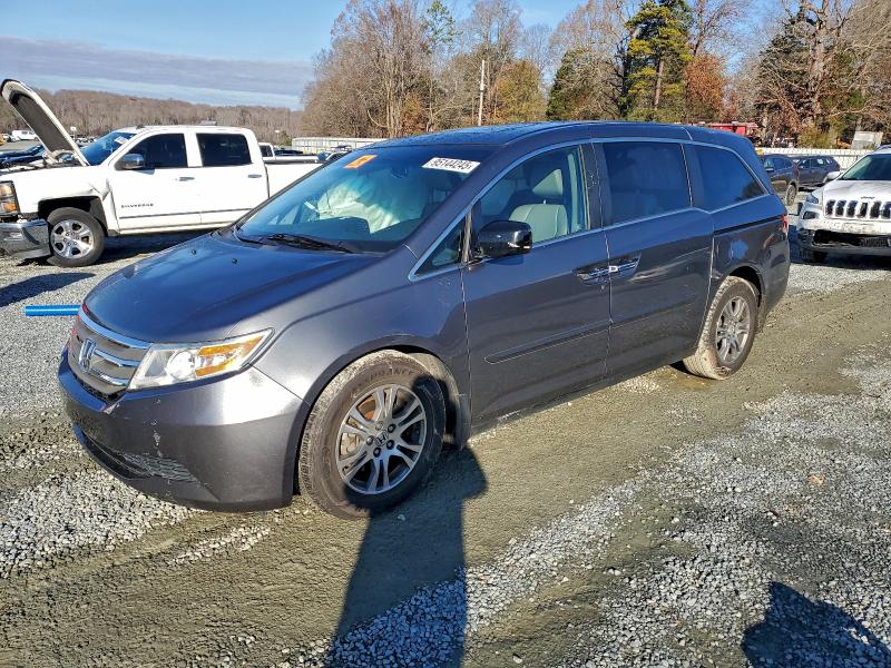 HONDA ODYSSEY EX 2011 with VIN 5FNRL5H64BB076331 - Photo from auction
