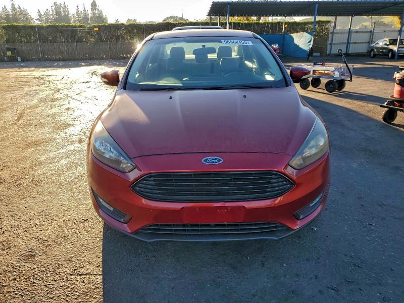 Photo 5 from auction – 2016 FORD FOCUS SE with VIN 1FADP3FE2GL380216
