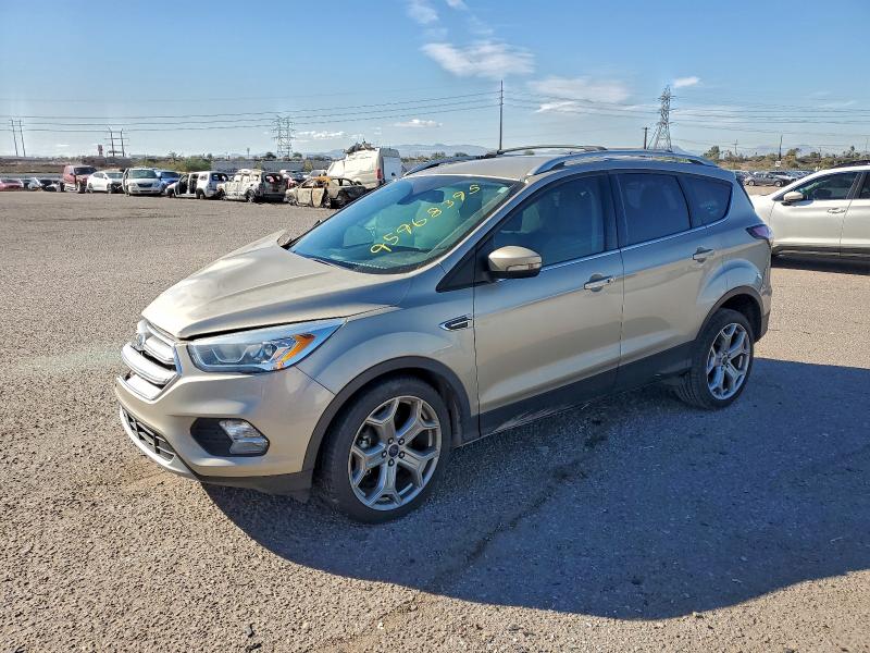 FORD ESCAPE TIT 2017 with VIN 1FMCU0JD8HUD20508 - Photo from auction