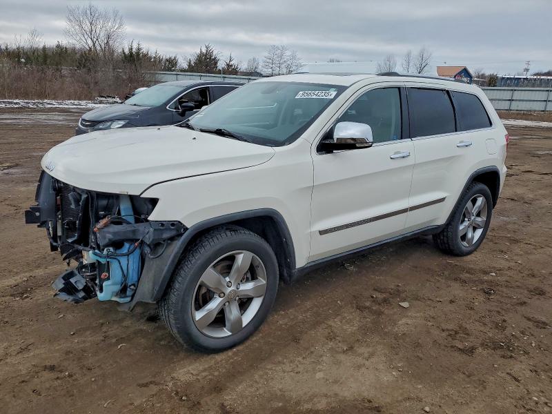 JEEP GRAND CHER 2011 with VIN 1J4RR5GT9BC575509 - Photo from auction