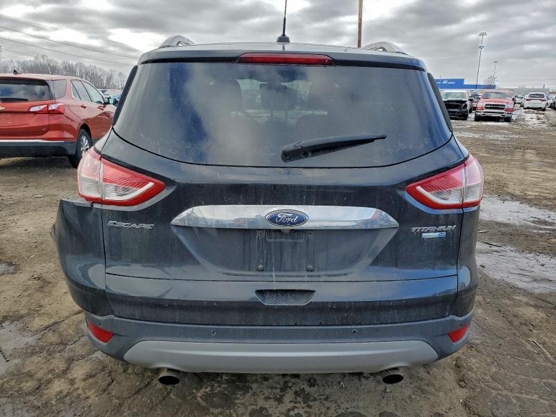 Photo 6 from auction – 2014 FORD ESCAPE TIT with VIN 1FMCU9J95EUD85683