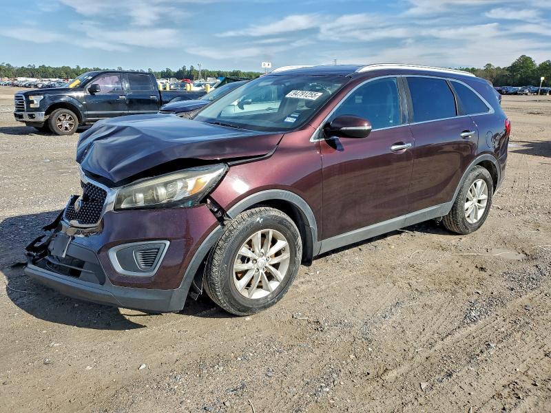 KIA SORENTO LX 2016 with VIN 5XYPG4A39GG058445 - Photo from auction