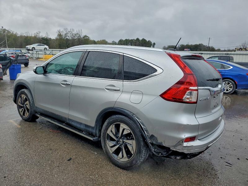 Photo 2 from auction – 2015 HONDA CR-V TOURI with VIN 5J6RM3H90FL022100