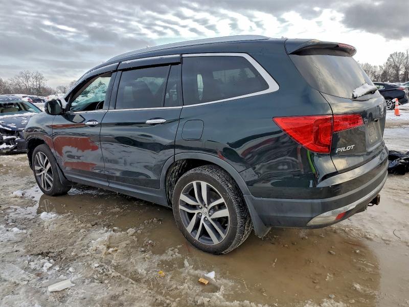 Photo 2 from auction – 2016 HONDA PILOT ELIT with VIN 5FNYF6H02GB090367