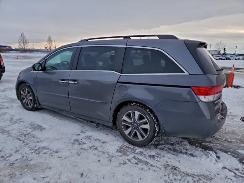 Photo 2 from auction – 2014 HONDA ODYSSEY with VIN 5FNRL5H61EB504229
