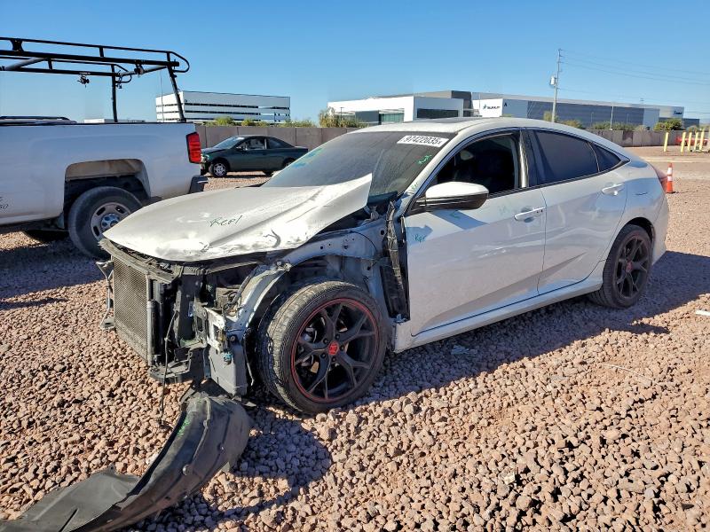 Photo 1 from auction – 2018 HONDA CIVIC EX with VIN 19XFC2F70JE038547