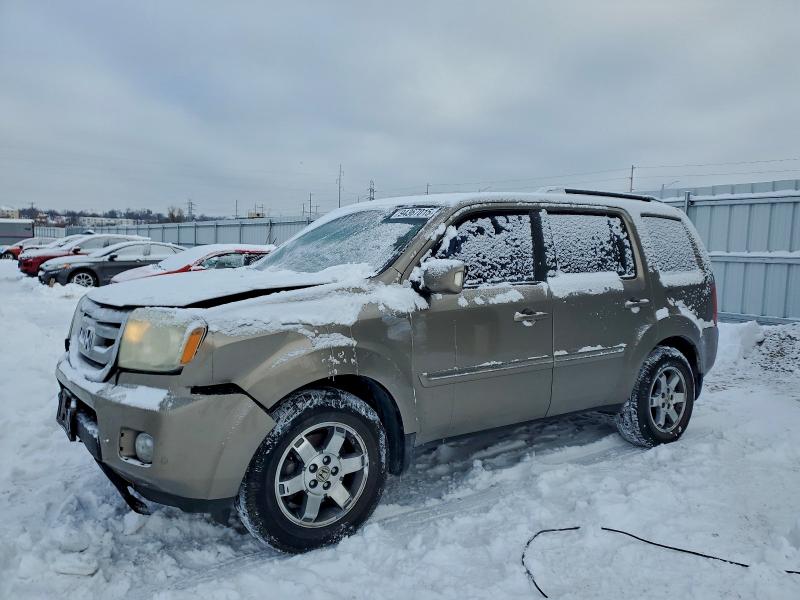 HONDA PILOT 2010 with VIN 5FNYF3H85AB014105 - Photo from auction