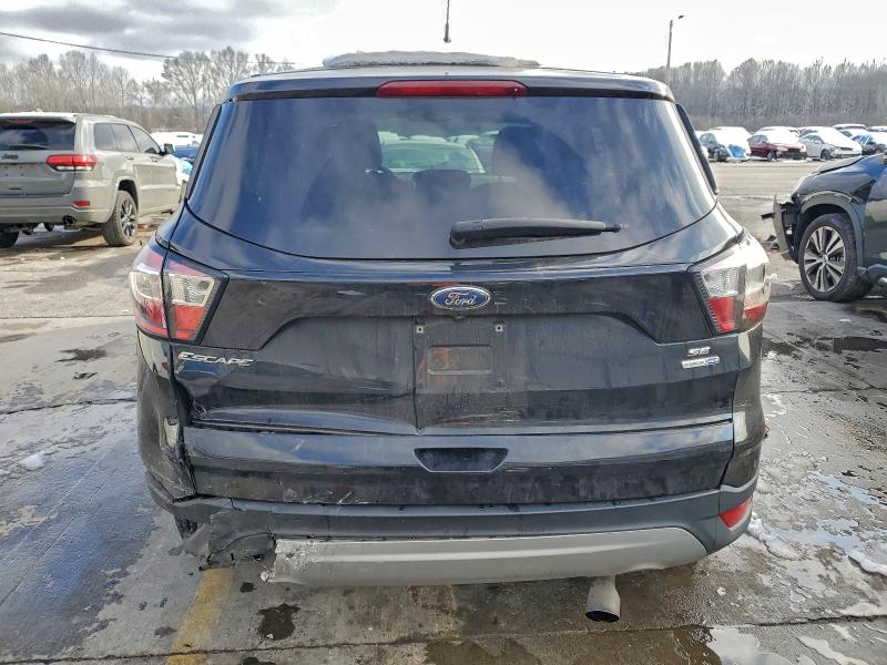 Photo 6 from auction – 2017 FORD ESCAPE with VIN 1FMCU9GD1HUE04634