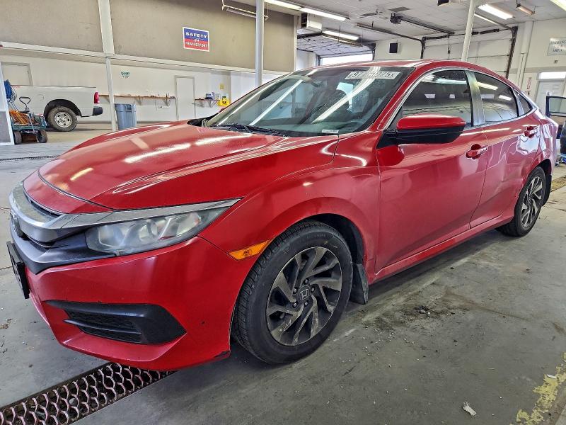 HONDA CIVIC EX 2018 with VIN 2HGFC2F76JH538525 - Photo from auction