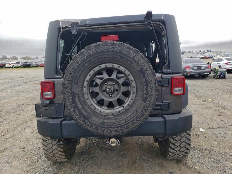 Photo 6 from auction – 2014 JEEP WRANGLER U with VIN 1C4HJWFGXEL223434