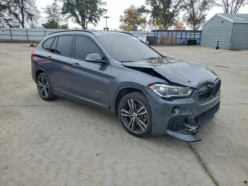 Photo 4 from auction – 2016 BMW X1 XDRIVE2 with VIN WBXHT3C30G5F67555